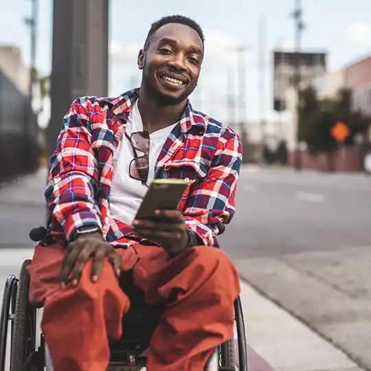 Young black man in wheelchair